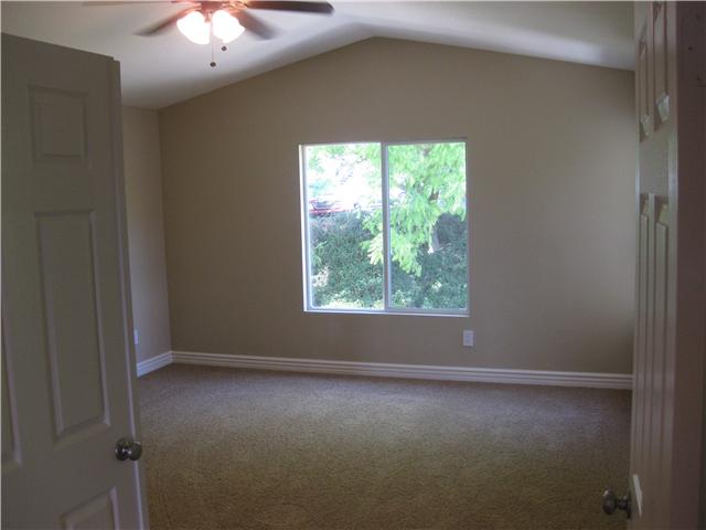 224 Manzanilla Way Oceanside, CA 92057 - Photo 11 of 22 Cathedral ceiling, double entry door, large room! The foyer upstairs has nice wood floors!