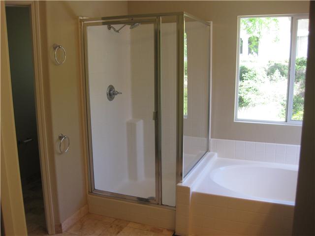 224 Manzanilla Way Oceanside, CA 92057 - Photo 14 of 22 Master shower and walk in closet here, therefore making your master suite very large!