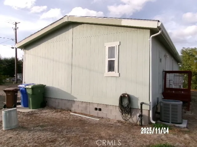 a backyard of a house with seating space