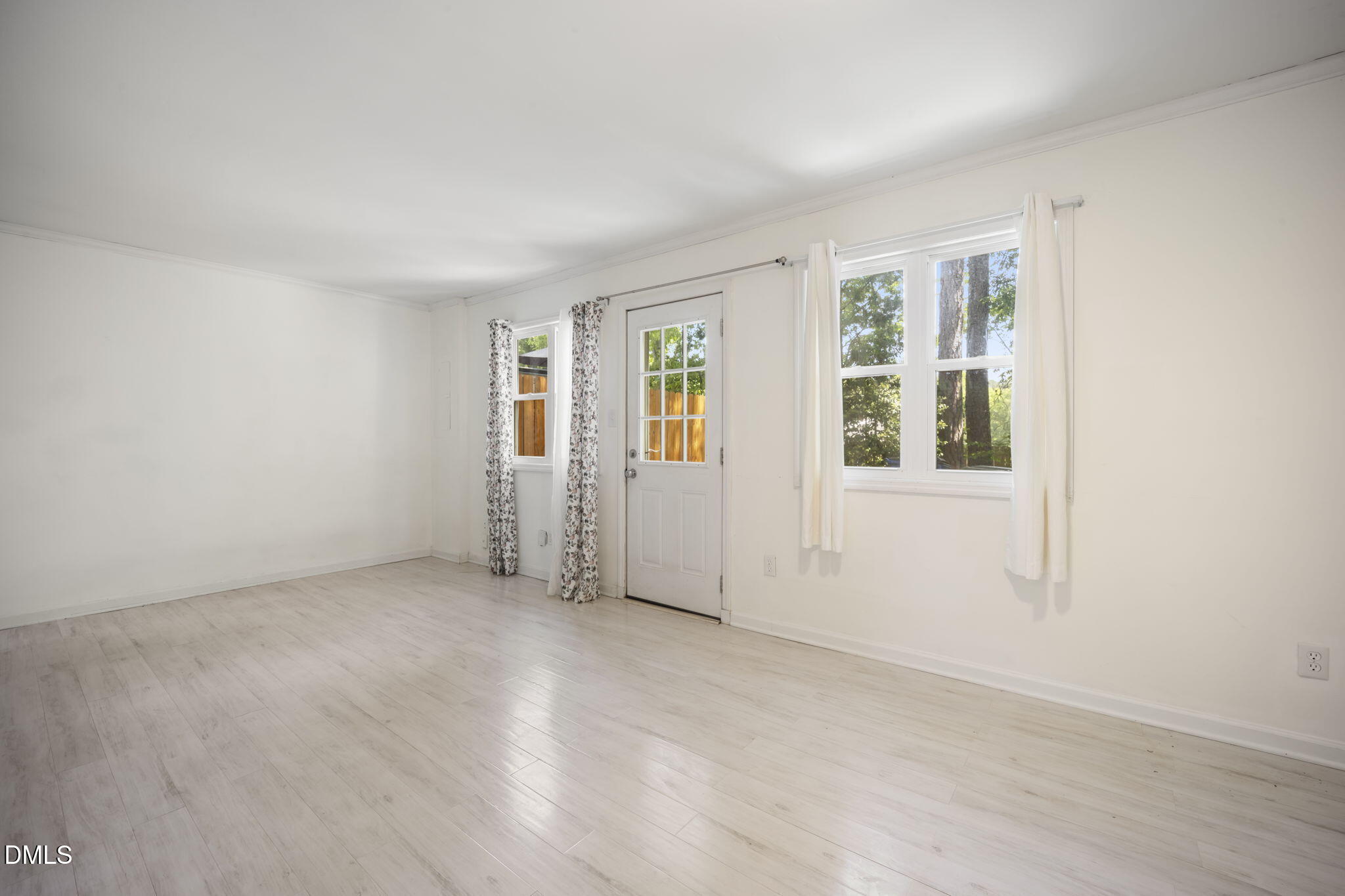 7728 Crown Crest Court Raleigh, NC 27615 - Photo 14 of 38 an empty room with windows