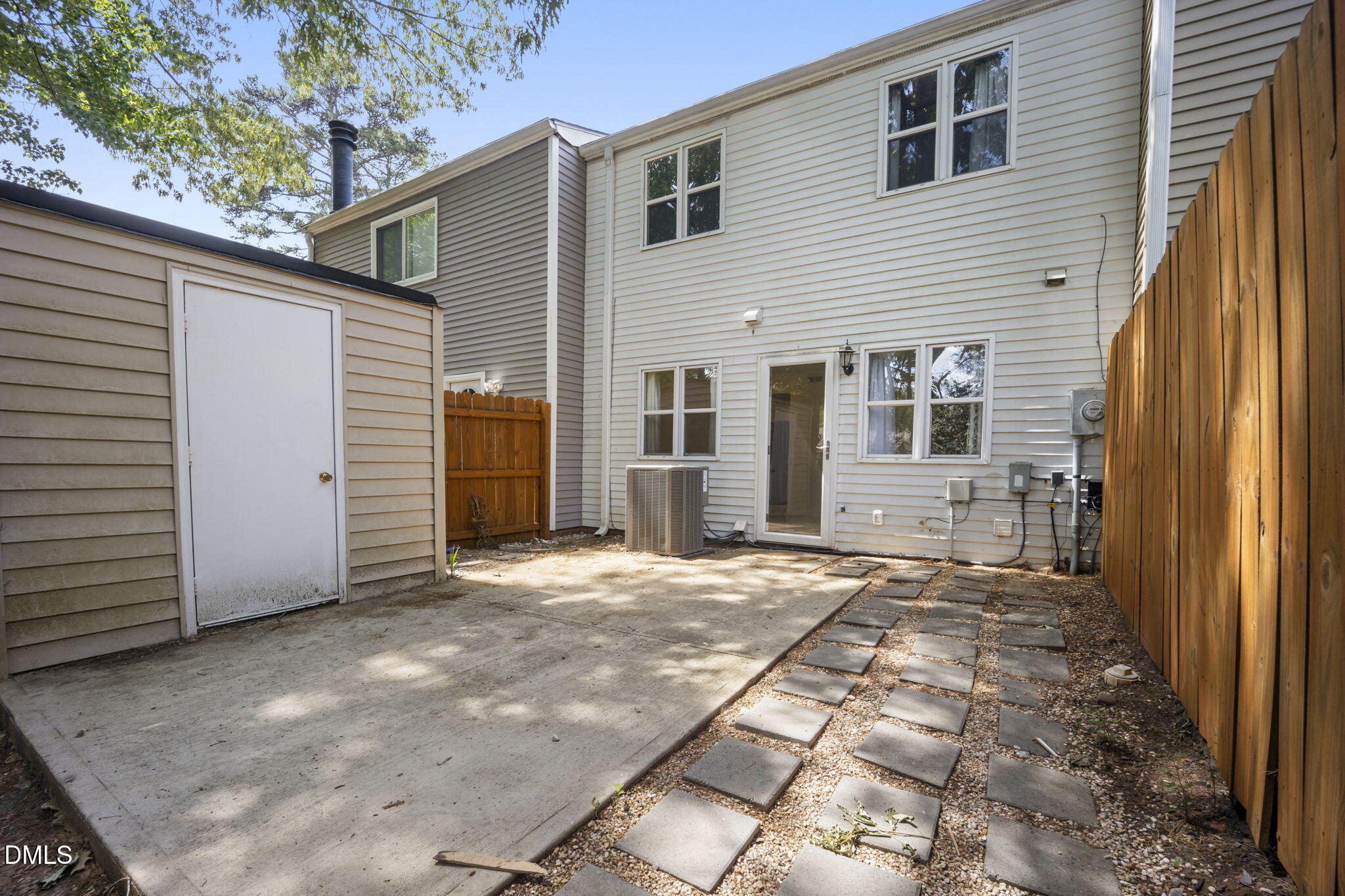 7728 Crown Crest Court Raleigh, NC 27615 - Photo 26 of 38 a view of a house with a backyard