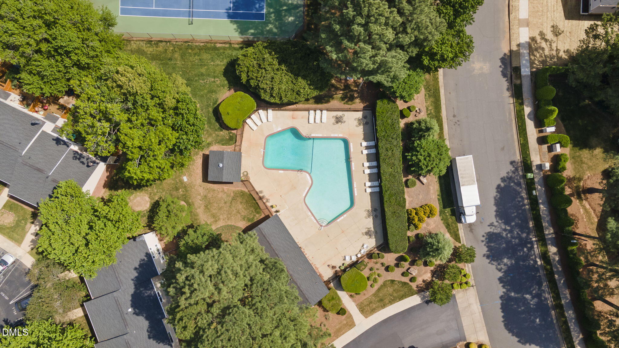 7728 Crown Crest Court Raleigh, NC 27615 - Photo 29 of 38 an aerial view of a house with a yard and garden