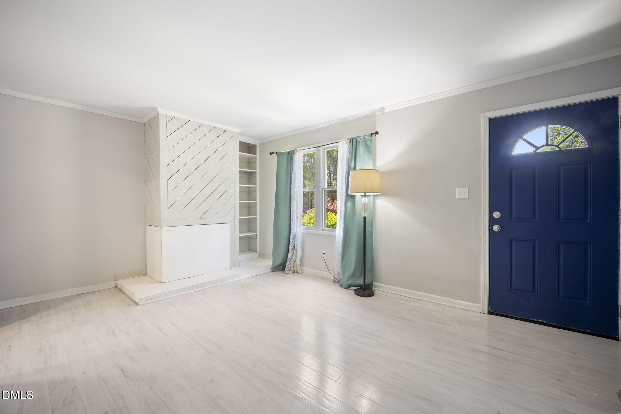 7728 Crown Crest Court Raleigh, NC 27615 - Photo 5 of 38 a view of an empty room with a window