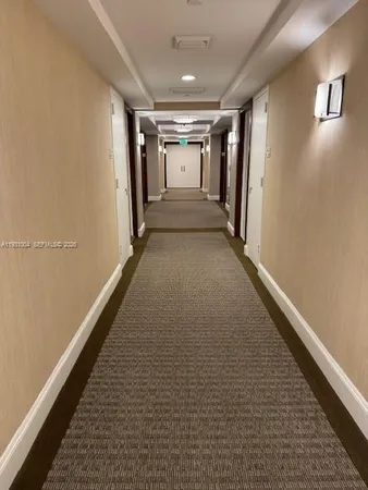 a view of hallway with stairs