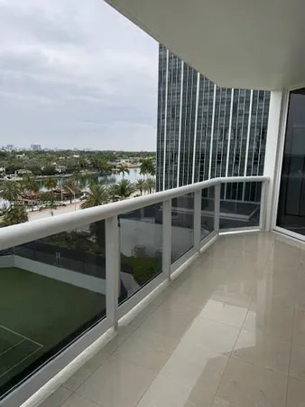 a view of balcony with furniture