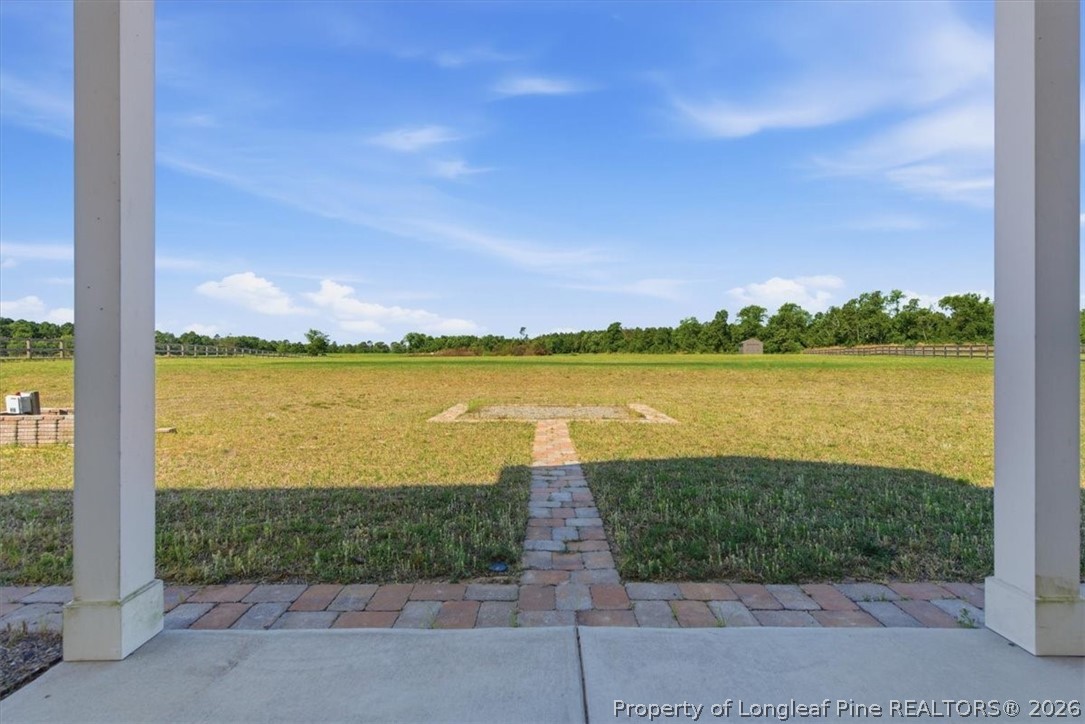 339 Rocking Horse Lane Raeford, NC 28376 - Photo 36 of 47 a view of a lake with a city view