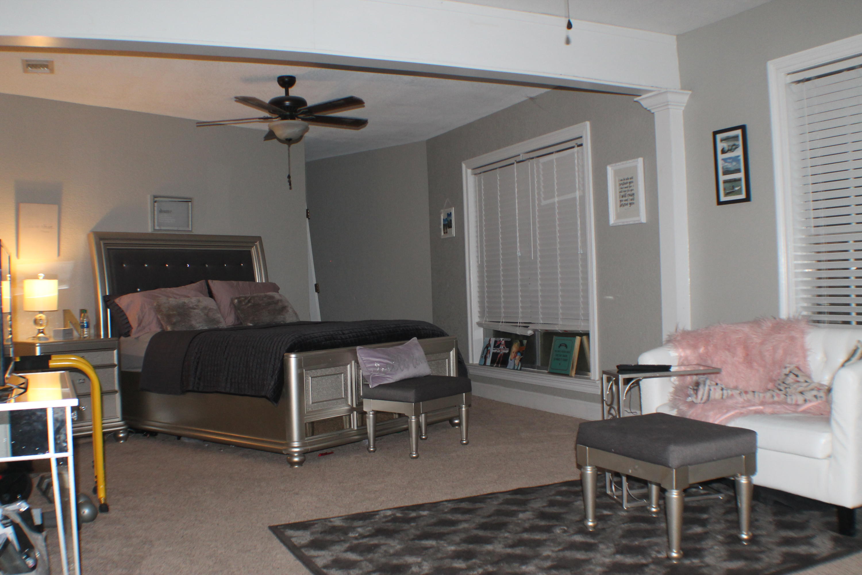 5843 Dairy Road Baker, FL 32531 - Photo 20 of 37 a bedroom with furniture and a chair