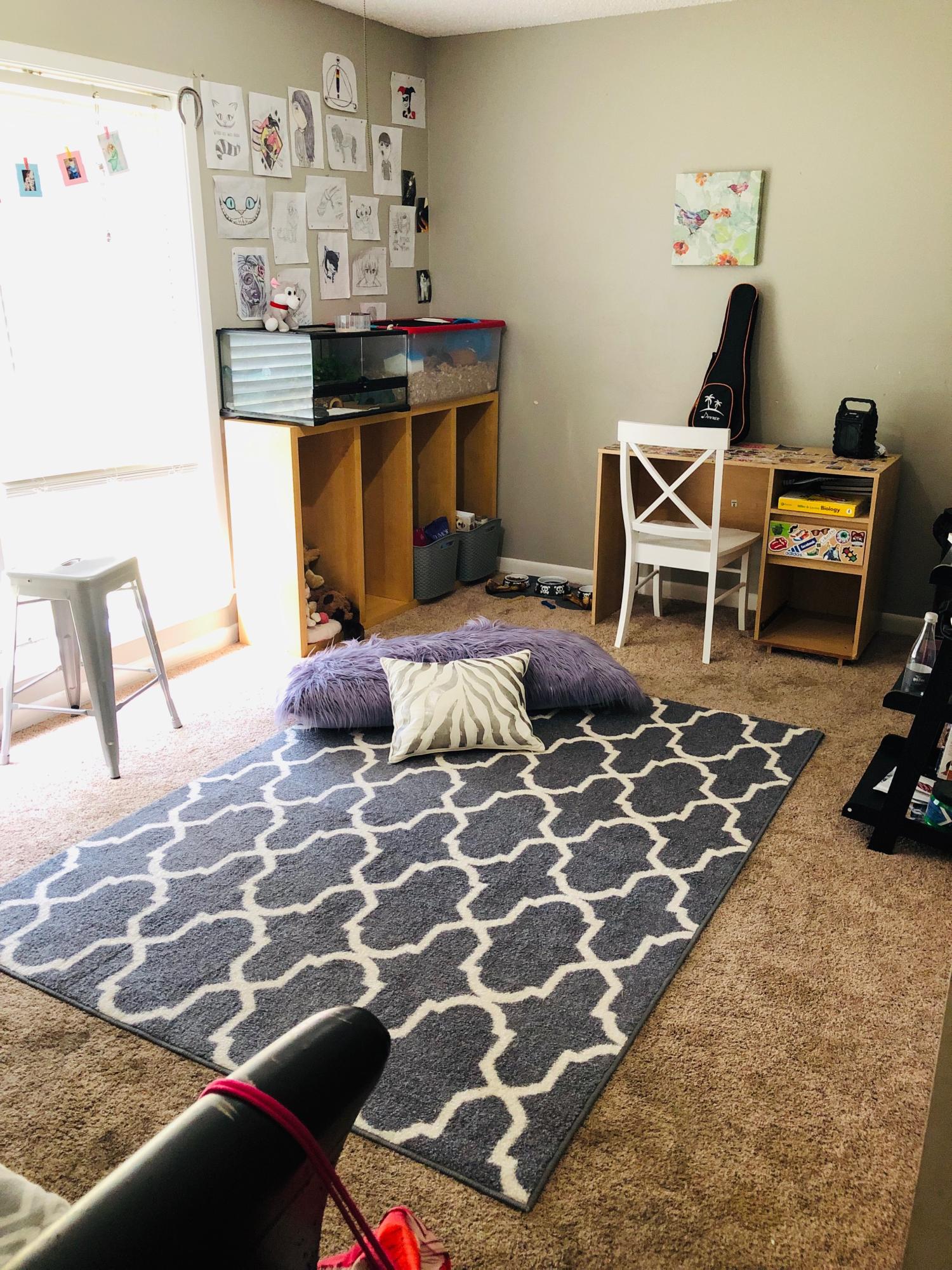 5843 Dairy Road Baker, FL 32531 - Photo 24 of 37 a bedroom with a bed and gym equipment