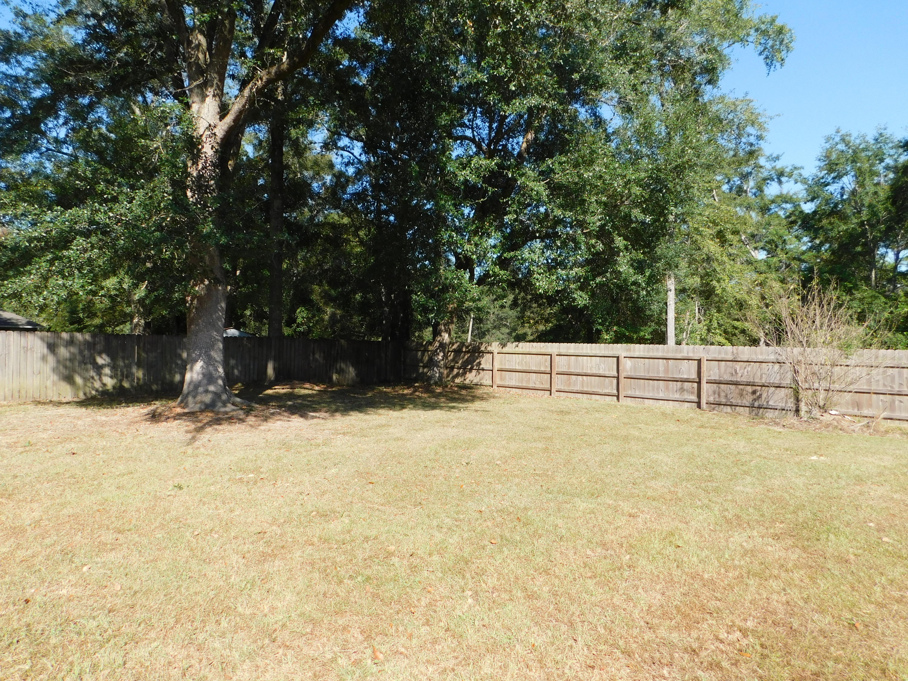 5843 Dairy Road Baker, FL 32531 - Photo 35 of 37 a view of back yard of the house