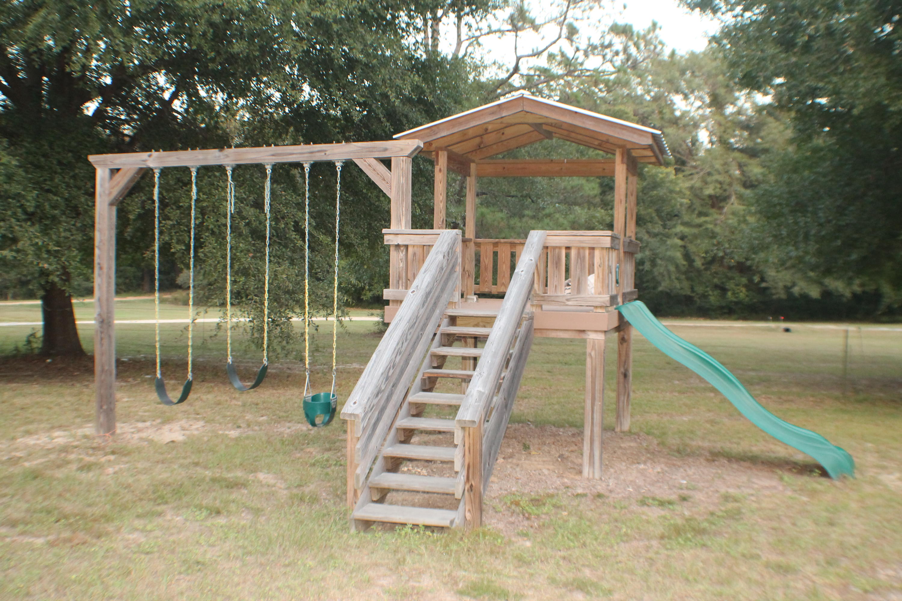 5843 Dairy Road Baker, FL 32531 - Photo 9 of 37 a view of outdoor space and deck