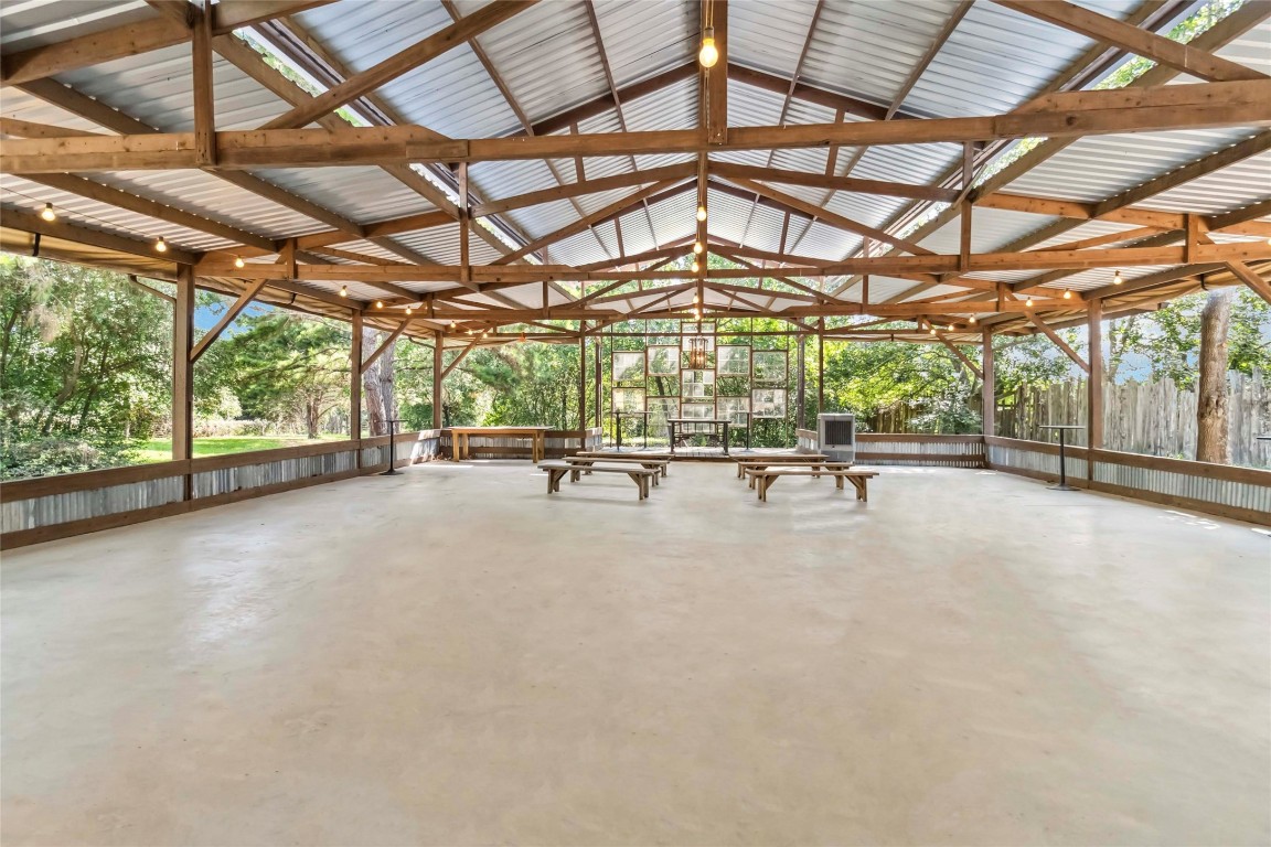 208 Old Potato Road Paige, TX 78659 - Photo 19 of 40 a view of an empty room with a iron stairs
