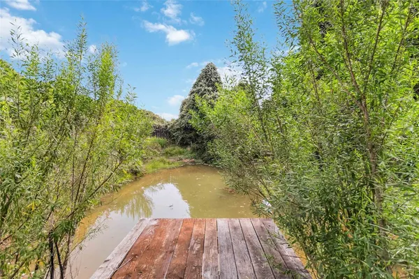 a view of a lake from a balcony