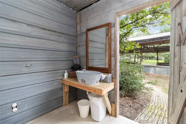 a view of a kitchen with furniture and a kitchen