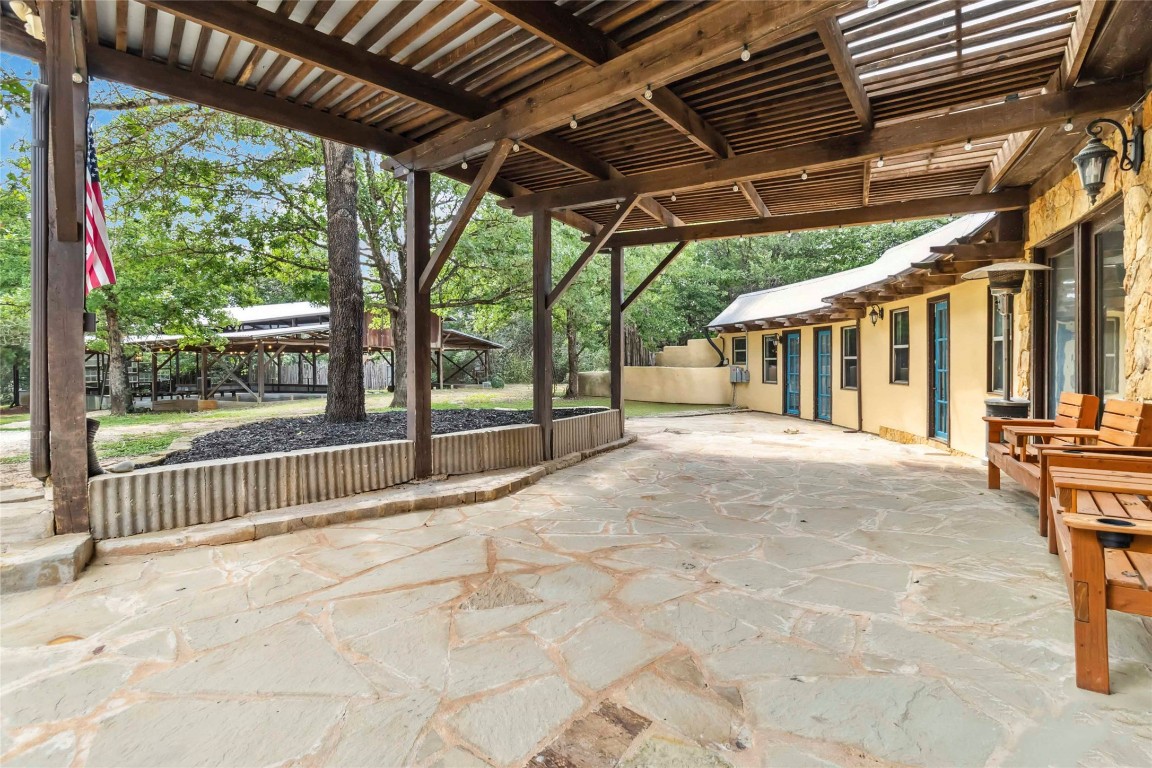 208 Old Potato Road Paige, TX 78659 - Photo 6 of 40 a view of a porch with wooden stairs