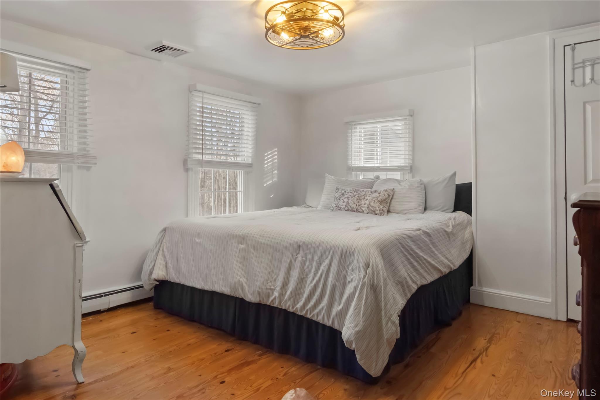 195 Pressler Road Wallkill, NY 12589 - Photo 26 of 45 a bedroom with a bed and a window
