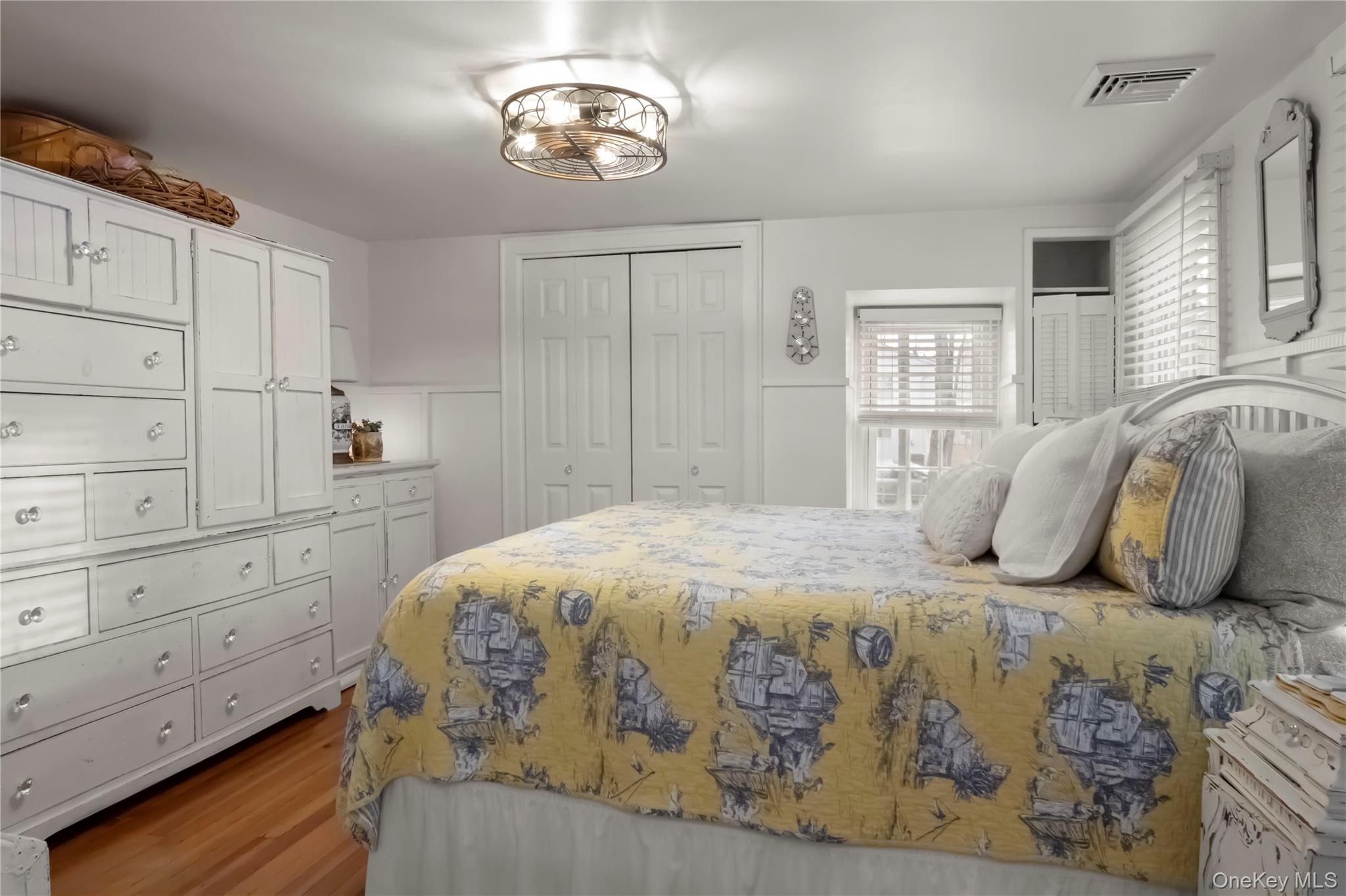 195 Pressler Road Wallkill, NY 12589 - Photo 27 of 45 a bedroom with a bed and dresser