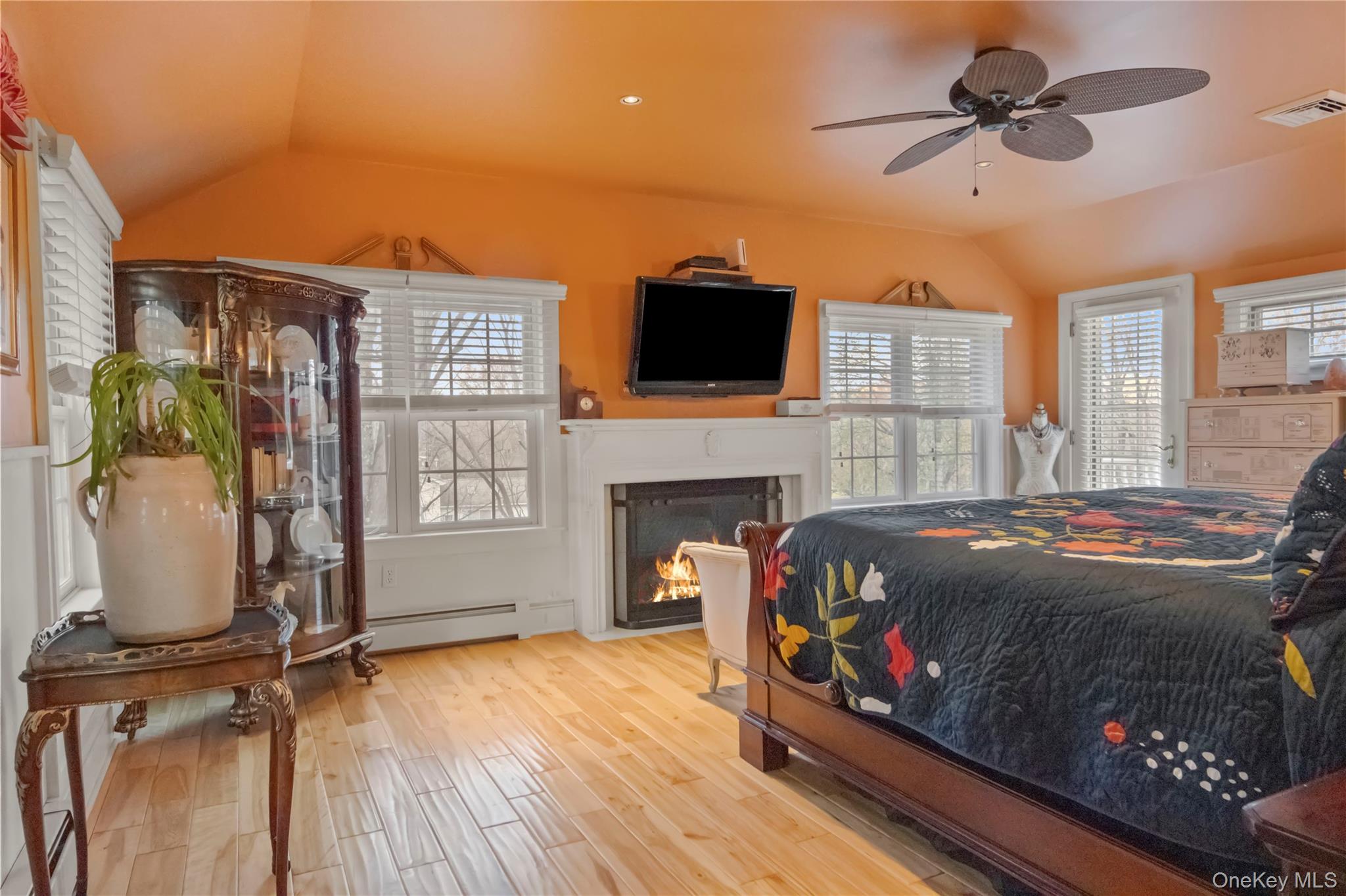 195 Pressler Road Wallkill, NY 12589 - Photo 31 of 45 a bedroom with a bed and a fireplace