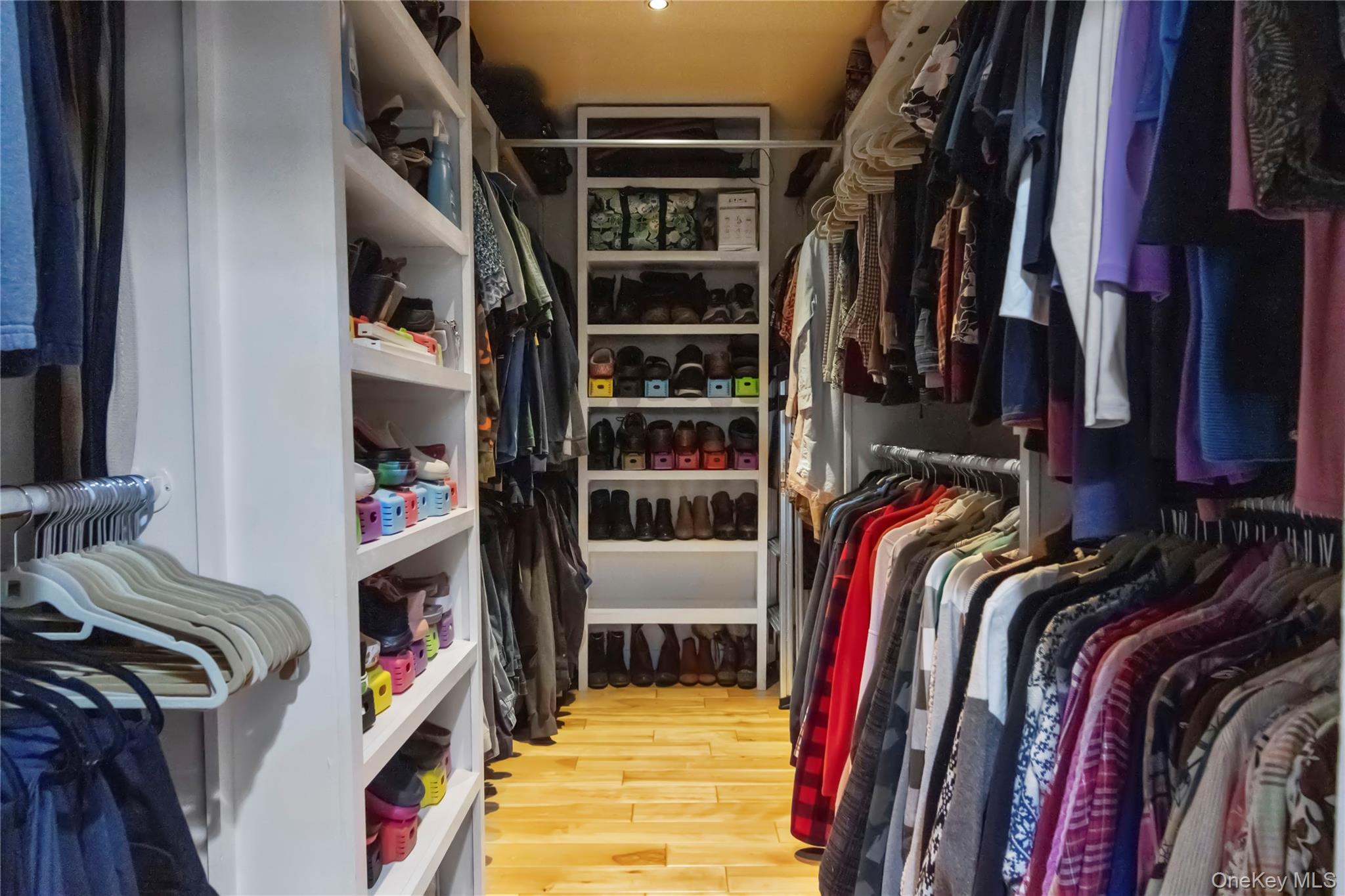 195 Pressler Road Wallkill, NY 12589 - Photo 33 of 45 a view of walk in closet with clothes and shoes