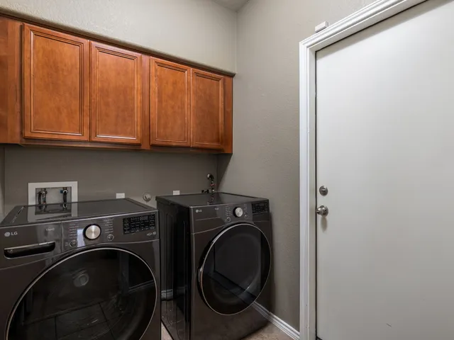 a swimming pool with some trees in the background