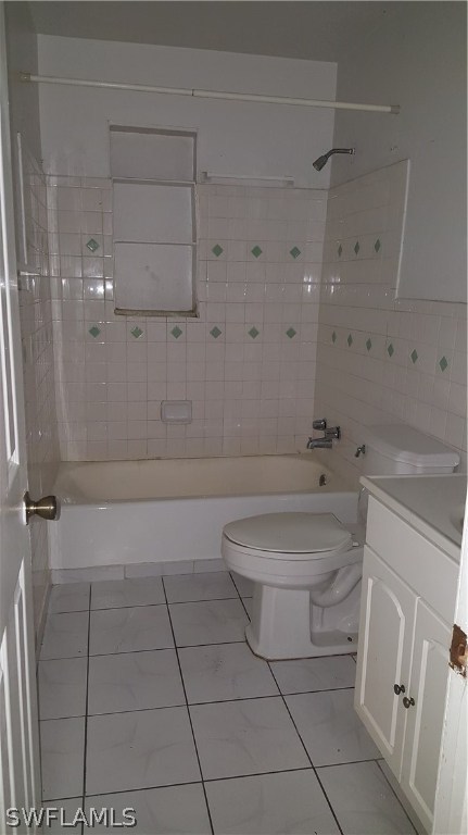 1924 Coronado Road Fort Myers, FL 33901 - Photo 8 of 11 a bathroom with a tub shower vanity and a sink
