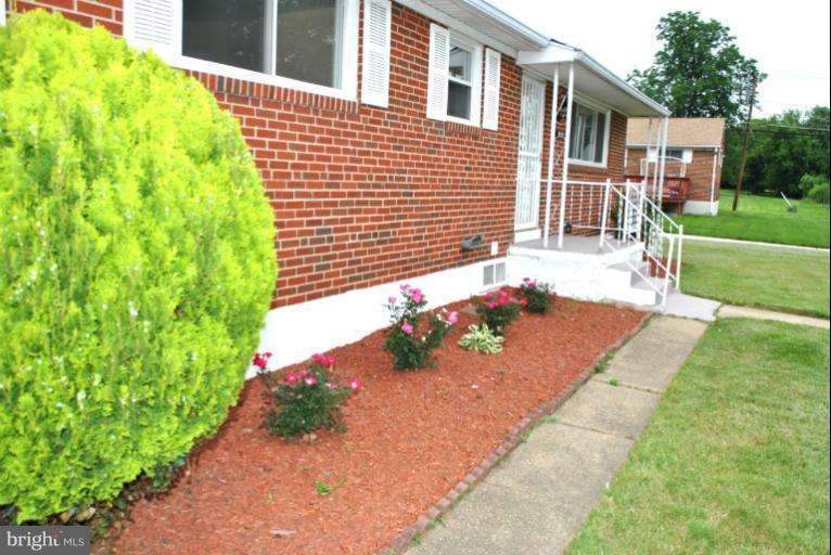 2820 Greenlawn Road Baltimore, MD 21207 - Photo 20 of 26 a view of a backyard with sitting area