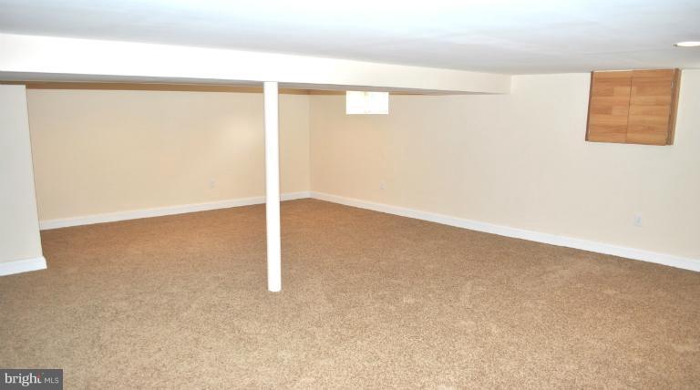 2820 Greenlawn Road Baltimore, MD 21207 - Photo 6 of 26 a view of an empty room
