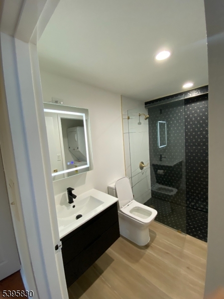 262 Main Street Little Falls, NJ 07424 - Photo 14 of 16 a bathroom with a sink toilet and shower