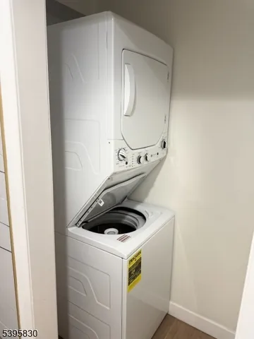 a view of outdoor space with wooden floor and window