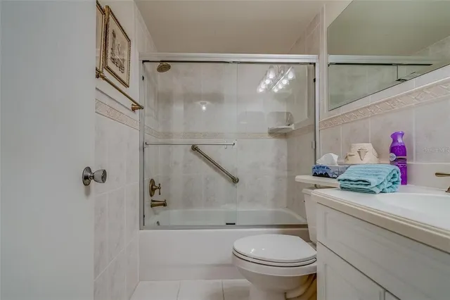 a view of an ocean with a mountain