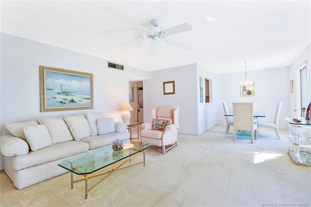 5443 Southeast Miles Grant Road, Unit D205 Stuart, FL 34997 - Photo 10 of 44 Open Living/Dining and pass through to Kitchen