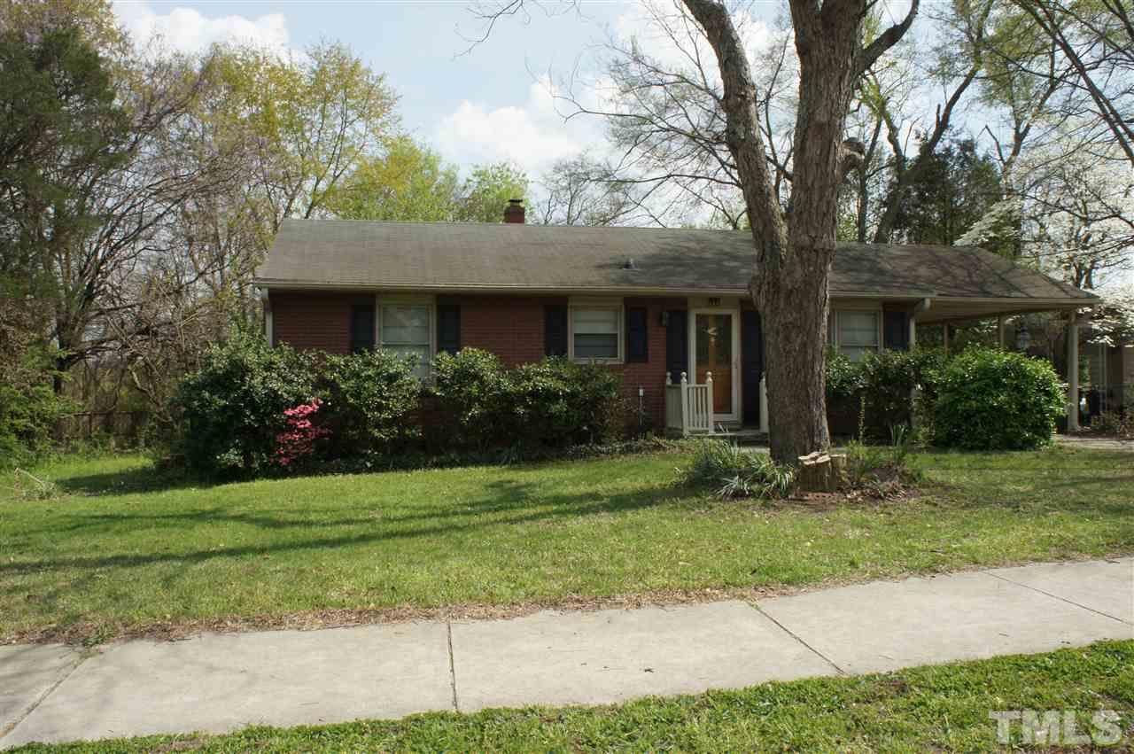 2832 Poole Road Raleigh, NC 27610 - Photo 1 of 16 a front view of a house with a garden