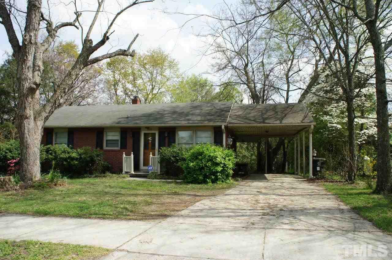 2832 Poole Road Raleigh, NC 27610 - Photo 2 of 16 a front view of a house with a garden
