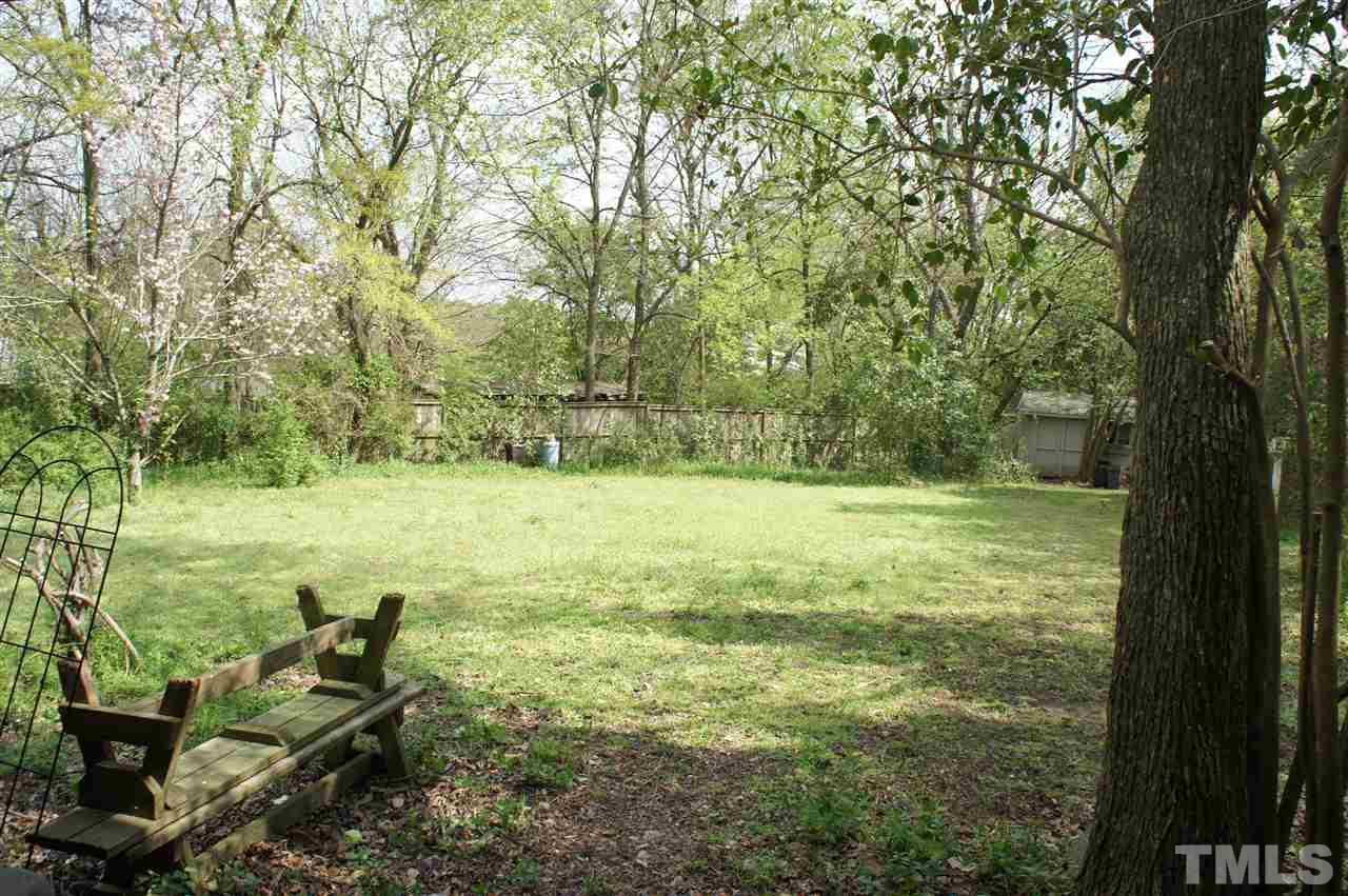 2832 Poole Road Raleigh, NC 27610 - Photo 14 of 16 a view of a garden with trees