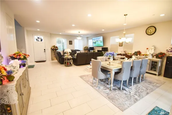 a spacious bathroom with a double vanity sink mirror and bathtub