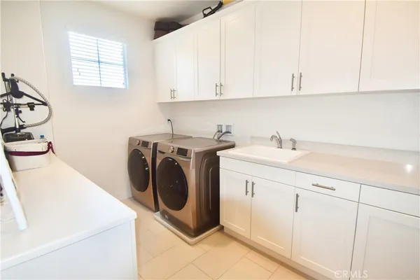 a view of staircase with white walls