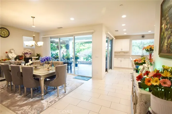 a kitchen with stainless steel appliances white cabinets and a sink