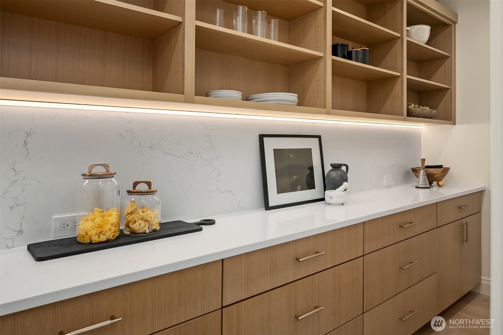 7626 Northeast 10th Street Medina, WA 98039 - Photo 12 of 40 a bathroom with a sink and cabinets