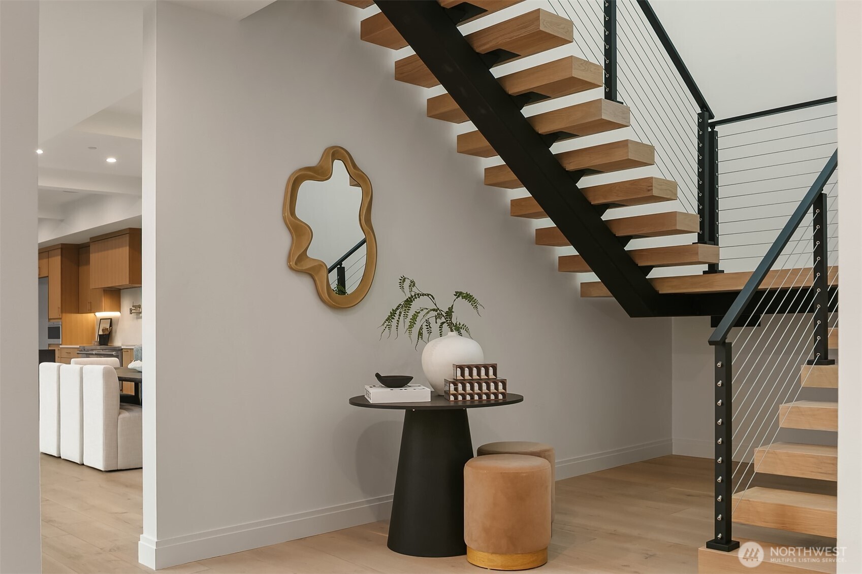 7626 Northeast 10th Street Medina, WA 98039 - Photo 19 of 40 a view of entryway and hall with wooden floor