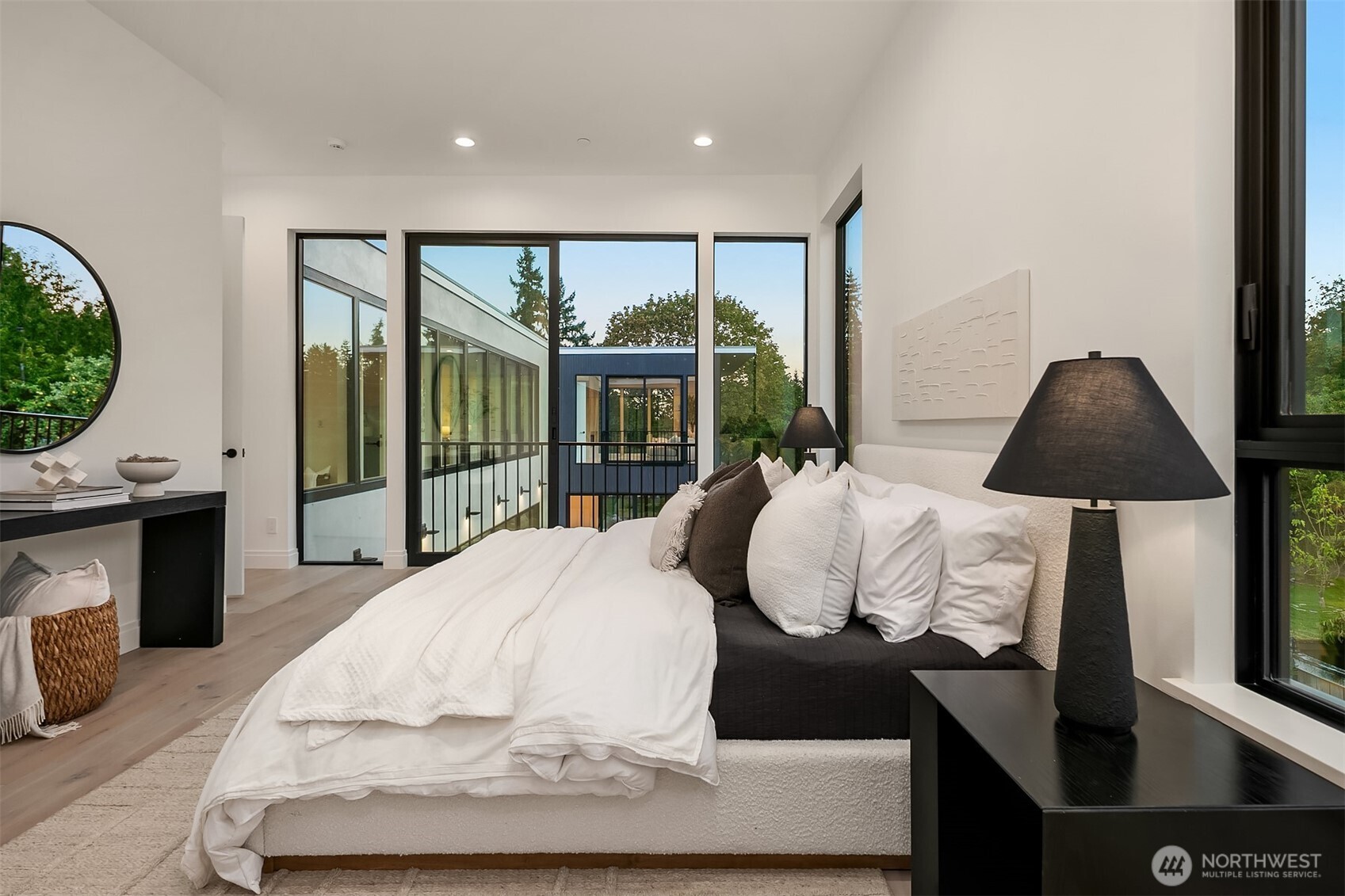 7626 Northeast 10th Street Medina, WA 98039 - Photo 24 of 40 a bed room with a bed and a large window