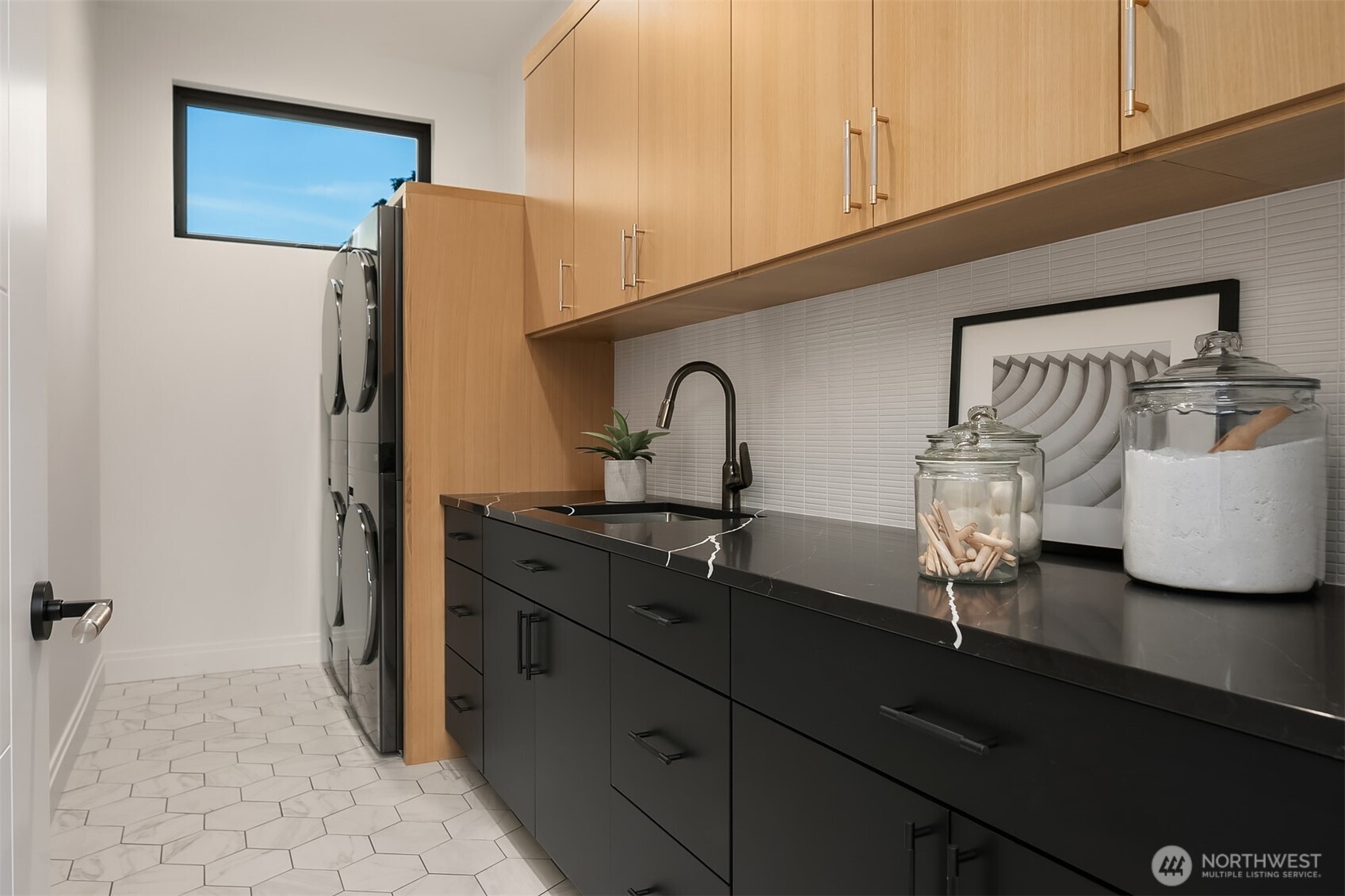 7626 Northeast 10th Street Medina, WA 98039 - Photo 27 of 40 a kitchen with a sink and cabinets