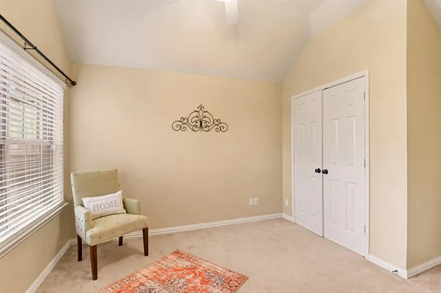 a bathroom with a granite countertop sink mirror and a bathtub