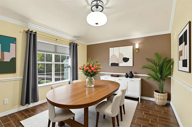a view of a livingroom with furniture and window