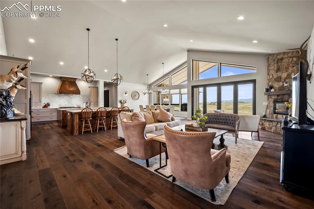 24365 Murphy Road Calhan, CO 80808 - Photo 14 of 50 a living room with lots of furniture and a large window