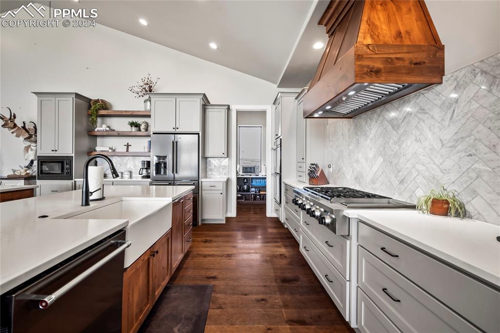 24365 Murphy Road Calhan, CO 80808 - Photo 20 of 50 a kitchen with stainless steel appliances granite countertop a sink and cabinets
