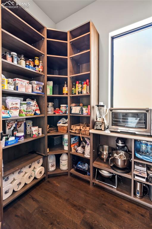 24365 Murphy Road Calhan, CO 80808 - Photo 24 of 50 a room with furniture and a book shelf
