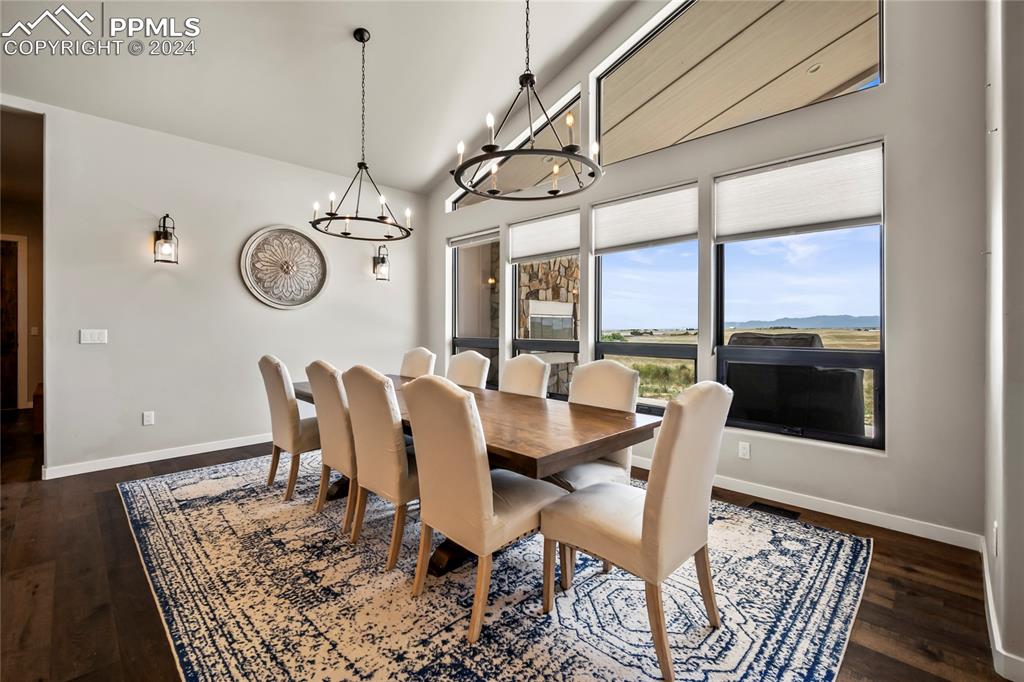 24365 Murphy Road Calhan, CO 80808 - Photo 26 of 50 a view of a dining room with furniture window and wooden floor