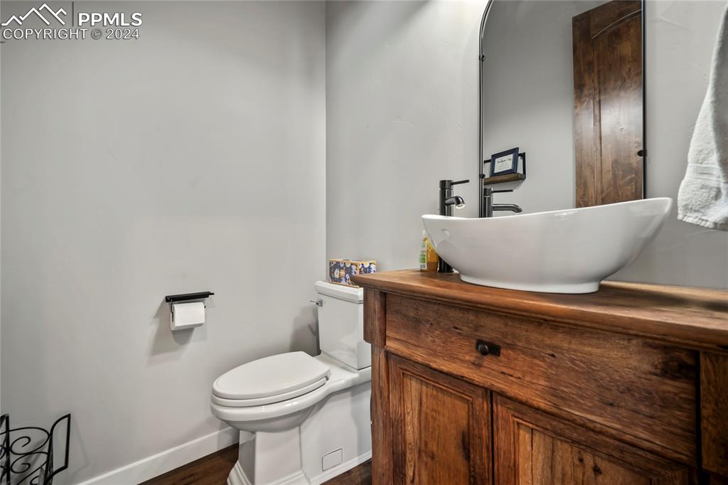 24365 Murphy Road Calhan, CO 80808 - Photo 28 of 50 a bathroom with a toilet and a sink