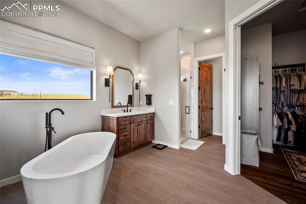 24365 Murphy Road Calhan, CO 80808 - Photo 31 of 50 a bathroom with a toilet sink and shower