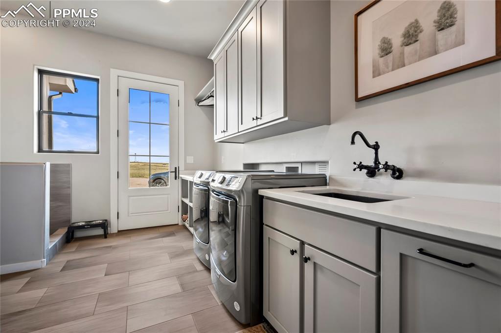 24365 Murphy Road Calhan, CO 80808 - Photo 42 of 50 a kitchen with a sink cabinets and window