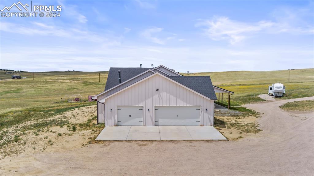 24365 Murphy Road Calhan, CO 80808 - Photo 7 of 50 a view of a house with a ocean view